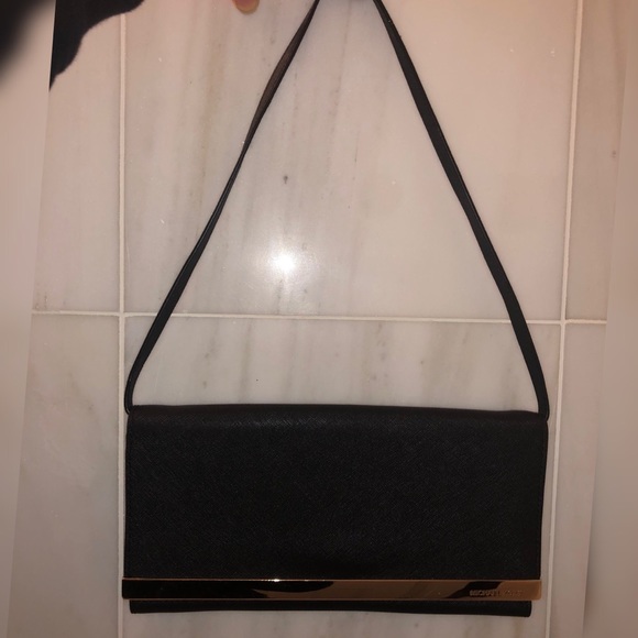 Michael Kors Handbags - Micheal Kors Clutch Bag. Black/Gold.